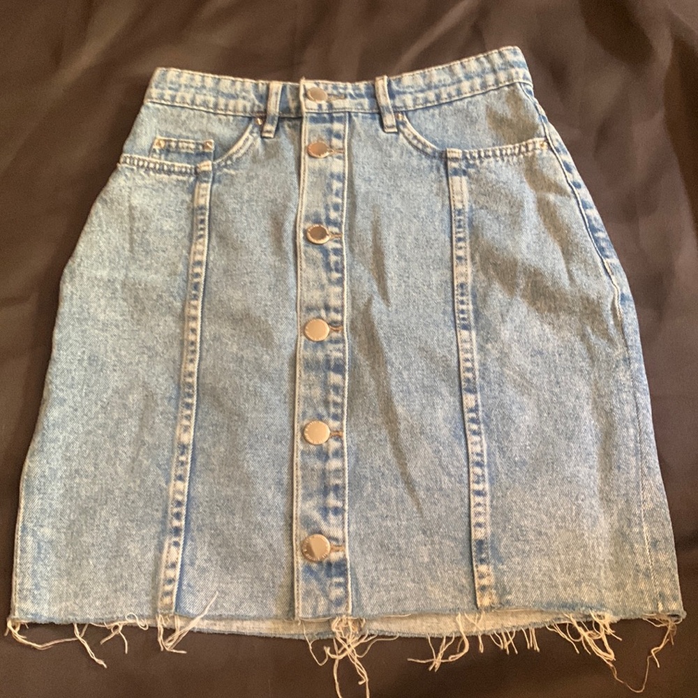 Never worn Jean skirts . Size 2.